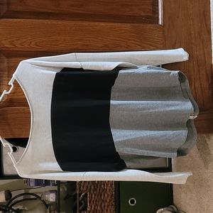 Tri-colored long sleeve. Button up Back.